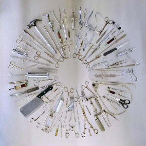 Обложка альбома Carcass «Surgical Remission/Surplus Steel» (2014)