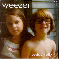 Обложка сингла Weezer «Buddy Holly» (1994)