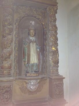 Статуя святого Люнэра. XVIII век. Храм в Миниак-су-Бешерель[фр.].