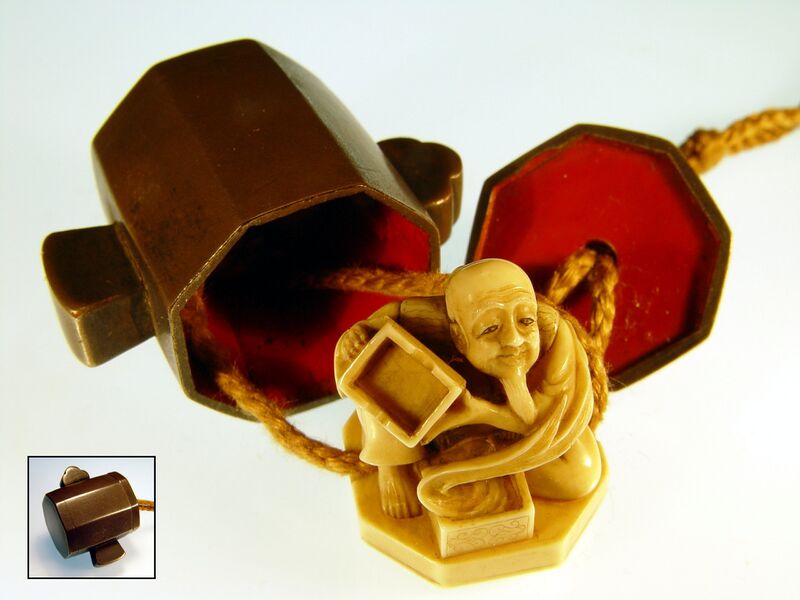 Файл:TrickNetsuke.jpg