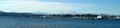 Puget Sound Naval Shipyard, as seen from across the water in Port Orchard. The mothballed ships are on the left, and the hammerhead crane is on the right.