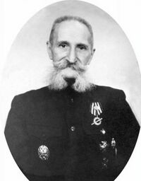 Евгений Григорьевич Булюбаш, со Знаком первопоходника. Фото после 1920 года
