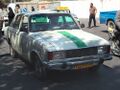 Обычное для Ирана маршрутное такси на одной из площадей Шираза