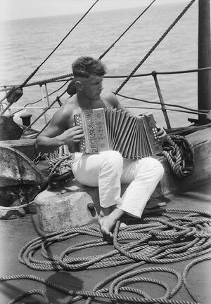 A sailor and his accordion onboard the Parma.jpg