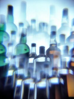 Alcohol bottles through multiprism filter.jpg