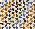 Мозаика на стене в городе Альгамбра, Испания (здесь стена полностью). Если игнорировать все цвета, получим p3 (если игнорировать только цвета звёзд, получим p1)