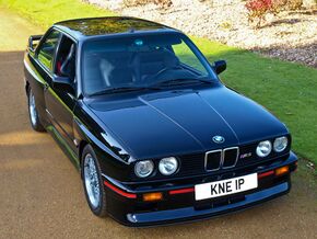 Black BMW M3 E30 fr.jpg