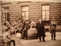 Bourgeois in the line to compulsory works Petrograd 1919.jpg