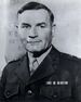 A black and white image of Charles Barrett, a white male in his Marine Corps dress uniform