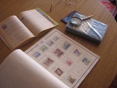 Издания разных лет испаноязычного каталога «SOCOPO» и альбом для генеральной коллекции марок Чили (без изображений марок)
