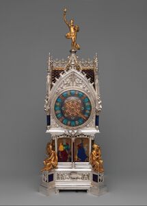 Настольные часы с календарем в неоготическом стиле, выставлявшиеся на Всемирной выставке 1889 года (cеребро, золото, эмаль, горный хрусталь, аметисты, бриллианты; 1881) — Метрополитен-музей