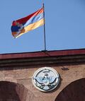 Flag and Crest on Public Building - Stepanakert - Nagorno-Karabakh (18900985430).jpg