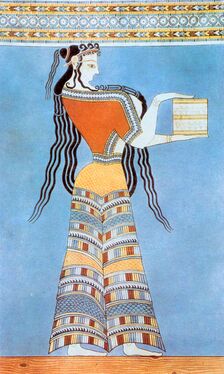Микенская женщина. 1300 г. до н. э. Жилет и юбка в форме колокола. Подчёркнута «осиная» талия