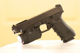 Glock 34 третьего поколения с тактическим фонариком