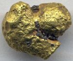 Gold nugget (placer gold) 2 (17025829922).jpg