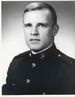 A black and white image of Graves wearing his Marine Corps dress blue uniform without his hat.