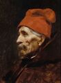 Old man wearing a red fez