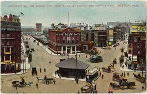 Colored print image of a city square in the 1900s