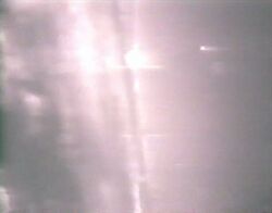Кадр видеозаписи воздушного боя, сделанной с борта одного из F-14: ракета только что попала в сопло второго МиГа.