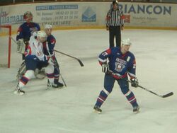 Миха Реболь в матче Словения—Франция Европейского хоккейного вызова 2003