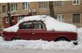 занесённые снегом машины...