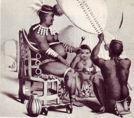 Инкоси Мпанде в окружении прислуги. Стул вырезан зулусскими мастерами из одного куска дерева. С рисунка Ангаса (ок.1848 г.)