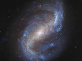 Фотография Галактики NGC 7496 космического телескопа Хаббл