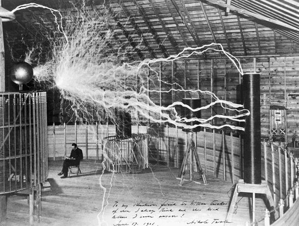 Nikola Tesla, with his equipment Wellcome M0014782.jpg