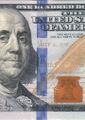 Оконная защитная нить Motion банкноты номиналом 100 долларов США (серия 2009 года)