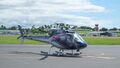 Вертолёт Eurocopter AS350 (DQ-HUG) вылетает из Международного аэропорта Нади (2017).