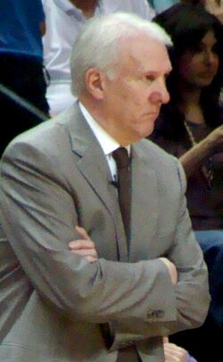 Popovich cross armed - Cropped-2.jpg