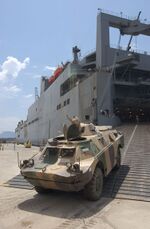 Red Cloud (T-AKR 313) unloads bulgarian vehicle.jpg