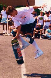 Photo of Rodney Mullen performing freestyle in 1988