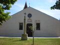 Фасад приходского храма-санктуария Пресвятой Богородицы (S. Maria della Pieve), Пьеве Колоньола-аи-Колли.