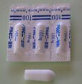 Ректальные суппозитории (в индивидуальных полимерных упаковках и вскрытый) со 100 мг ацетаминофена в каждом (Япония)
