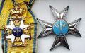 Знак и звезда ордена Меча степени командора I класса