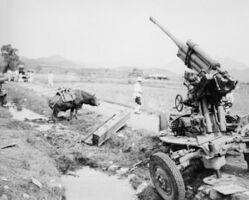 A Russian made M-1944 (KS-18) 85mm anti-aircraft gun, captured from the North Korean forces in the village of Chuchon-ni, Korea