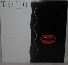 Обложка альбома Toto «Isolation» (1984)