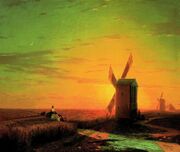 Windmills in the Ukrainian steppe at sunset.jpg