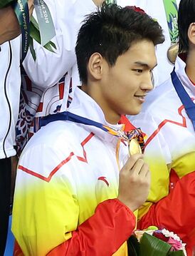Xu at the 2014 Asian Games Men's 4×100 m medley award ceremony.jpg