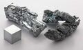 Цинк чистотой 99.995 %. Слева кристаллический фрагмент слитка, справа дендритная структура, полученная в результате возгонки. Для сравнения приведён кубик цинка объёмом 1 см³.